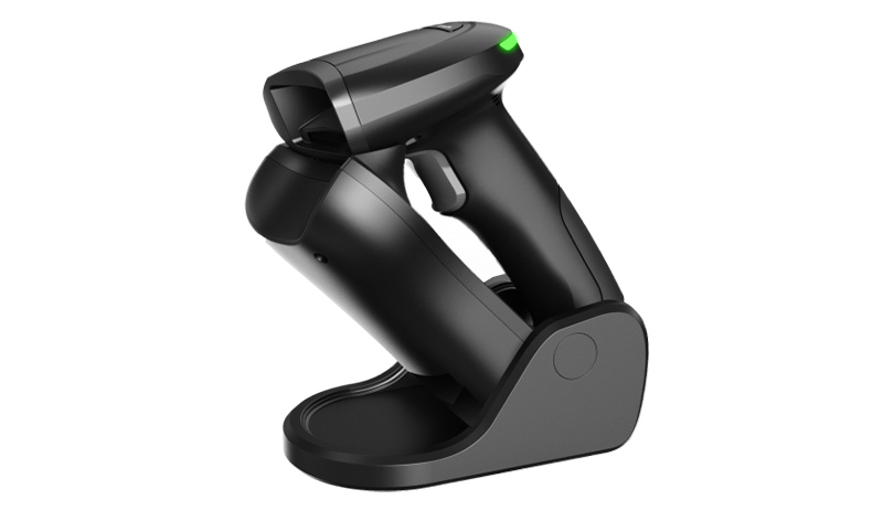 Handheld scanner de coduri de bare on a table.